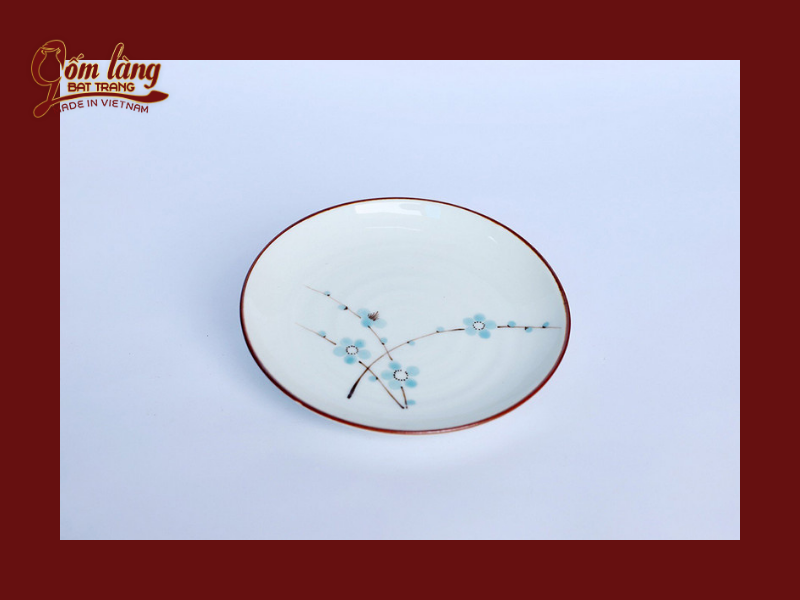 Mẫu đĩa tròn Bát Tràng men kem vẽ hoa đào xanh